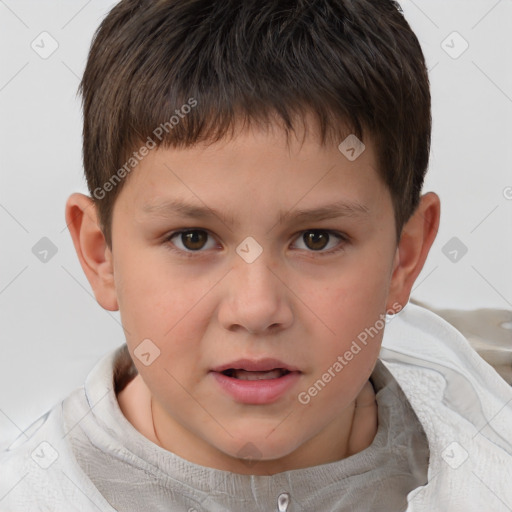 Joyful white child male with short  brown hair and brown eyes