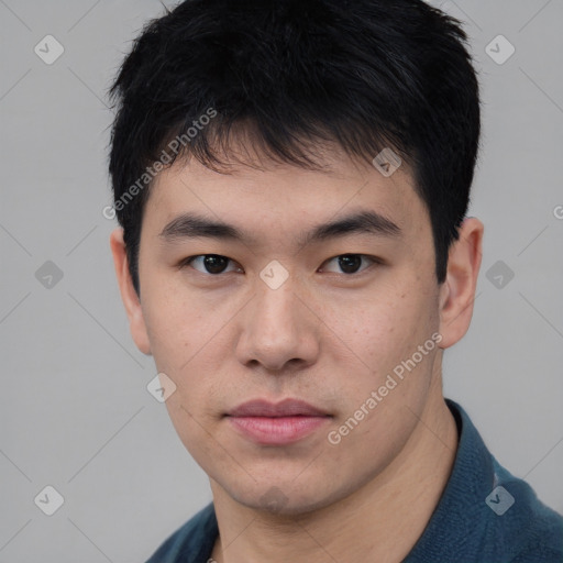 Neutral asian young-adult male with short  black hair and brown eyes