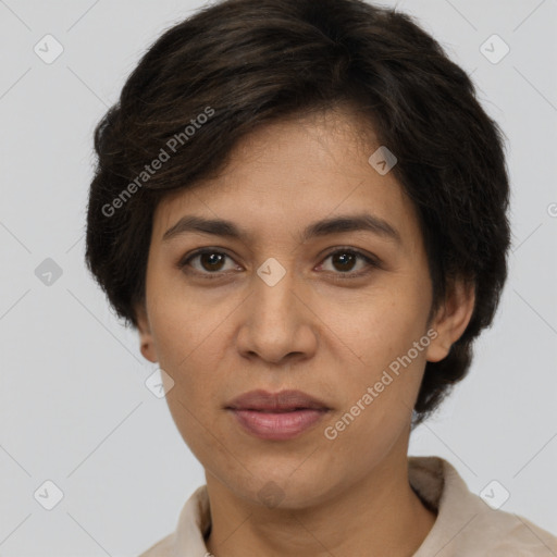 Joyful white adult female with short  brown hair and brown eyes