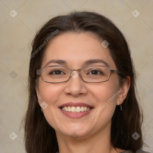 Joyful white adult female with medium  brown hair and brown eyes