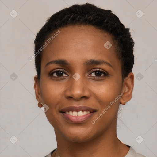 Joyful black young-adult female with short  black hair and brown eyes