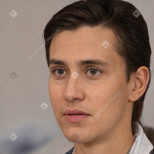 Neutral white young-adult male with short  brown hair and brown eyes