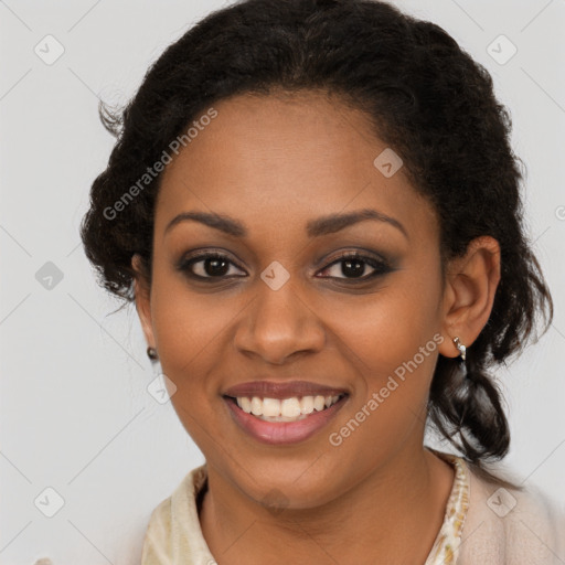 Joyful black young-adult female with long  brown hair and brown eyes