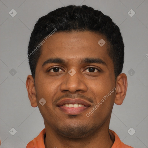 Joyful latino young-adult male with short  black hair and brown eyes