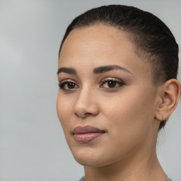 Joyful white young-adult female with short  black hair and brown eyes