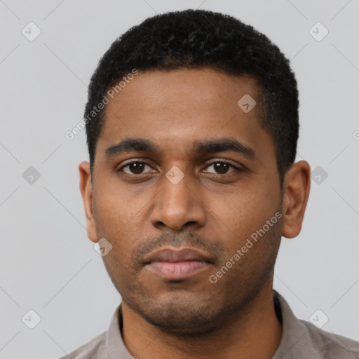 Neutral black young-adult male with short  black hair and brown eyes