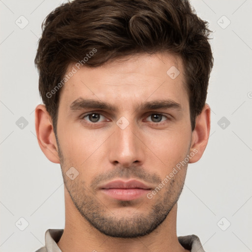 Neutral white young-adult male with short  brown hair and brown eyes