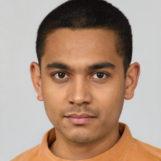 Neutral latino young-adult male with short  black hair and brown eyes