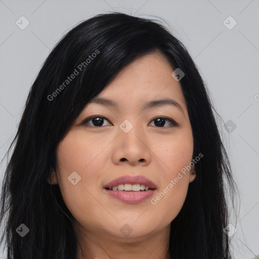 Joyful asian young-adult female with long  black hair and brown eyes