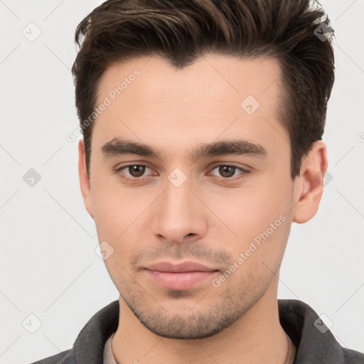 Neutral white young-adult male with short  brown hair and brown eyes