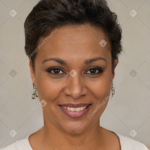 Joyful black young-adult female with short  brown hair and brown eyes