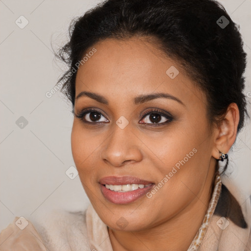 Joyful latino young-adult female with long  brown hair and brown eyes