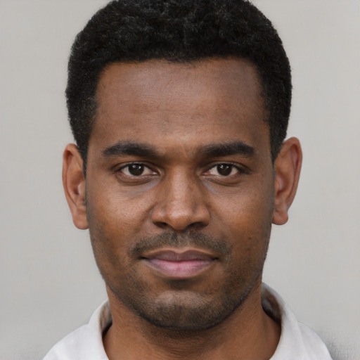 Neutral latino young-adult male with short  brown hair and brown eyes