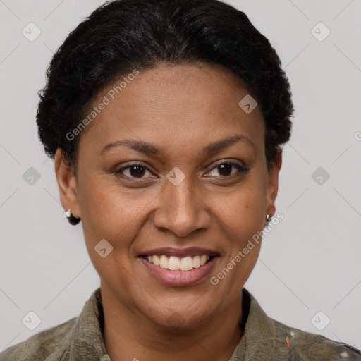 Joyful latino adult female with short  brown hair and brown eyes