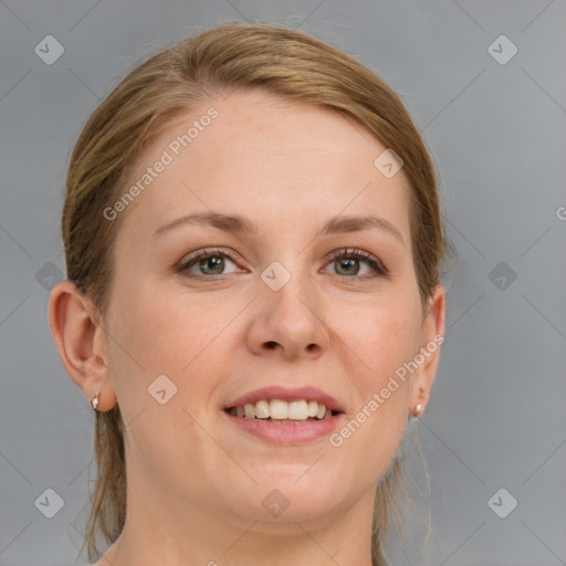 Joyful white young-adult female with medium  brown hair and blue eyes