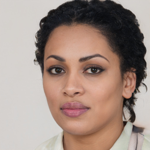 Neutral latino young-adult female with long  black hair and brown eyes