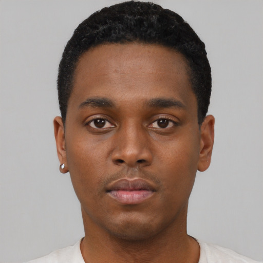 Neutral black young-adult male with short  black hair and brown eyes