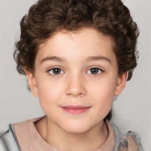 Joyful white child male with short  brown hair and brown eyes