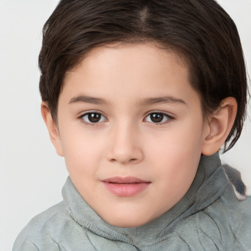 Joyful white child female with short  brown hair and brown eyes