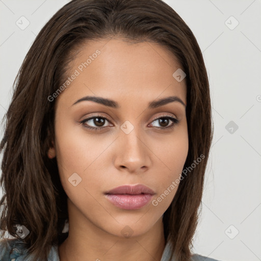 Neutral white young-adult female with long  brown hair and brown eyes