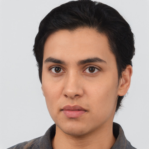 Neutral latino young-adult male with short  black hair and brown eyes