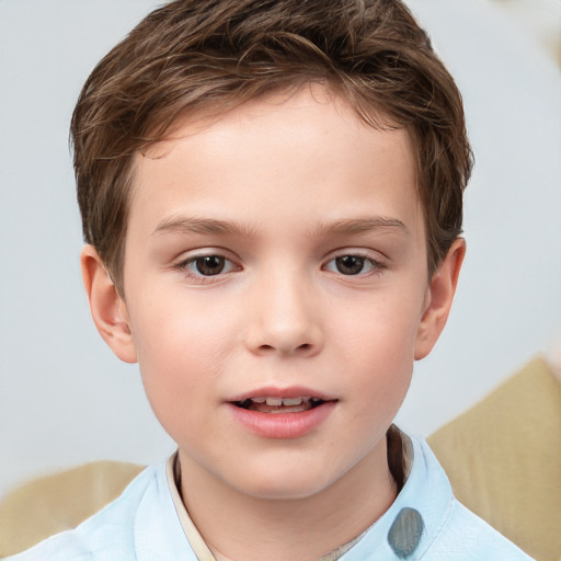 Joyful white child male with short  brown hair and brown eyes