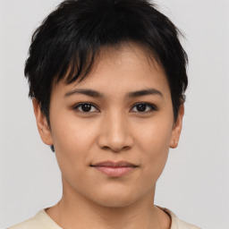 Joyful asian young-adult female with short  brown hair and brown eyes