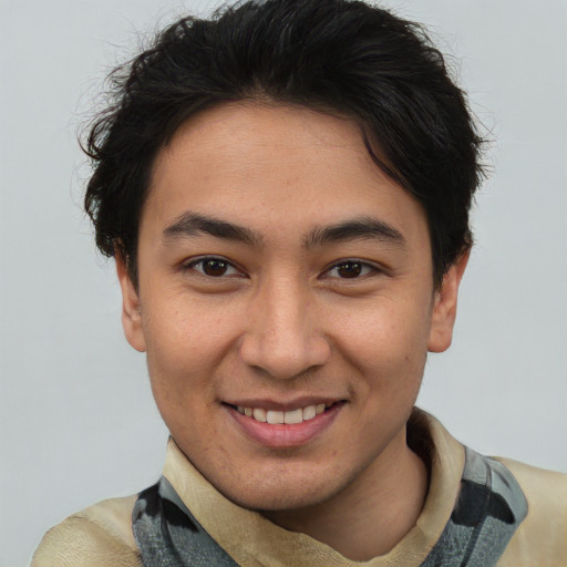 Joyful asian young-adult male with short  brown hair and brown eyes