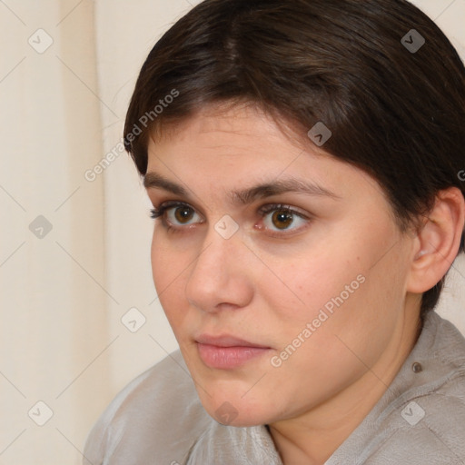 Neutral white young-adult female with short  brown hair and brown eyes