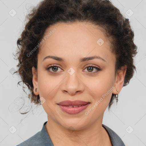 Joyful black young-adult female with medium  brown hair and brown eyes