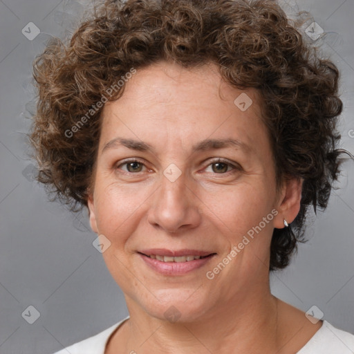 Joyful white adult female with short  brown hair and brown eyes