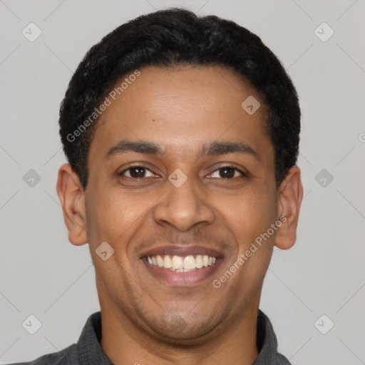 Joyful latino young-adult male with short  black hair and brown eyes