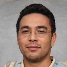 Neutral white young-adult male with short  black hair and brown eyes