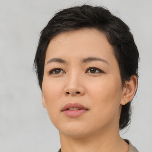 Neutral asian young-adult female with medium  black hair and brown eyes