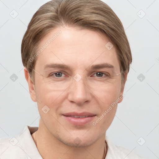 Joyful white young-adult female with short  brown hair and grey eyes