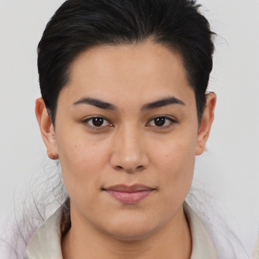 Joyful asian young-adult female with medium  brown hair and brown eyes