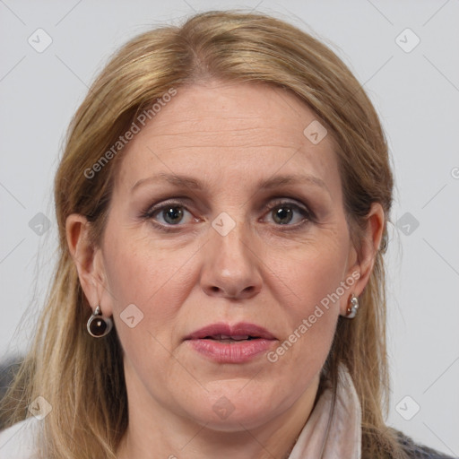 Joyful white adult female with medium  brown hair and grey eyes