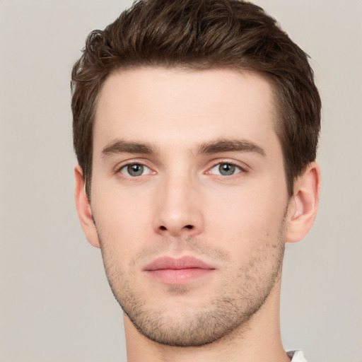 Neutral white young-adult male with short  brown hair and brown eyes