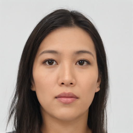 Neutral asian young-adult female with long  brown hair and brown eyes