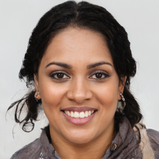Joyful latino young-adult female with medium  black hair and brown eyes