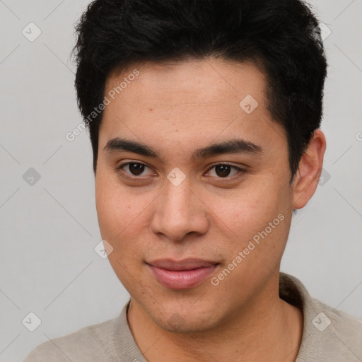 Joyful latino young-adult male with short  brown hair and brown eyes