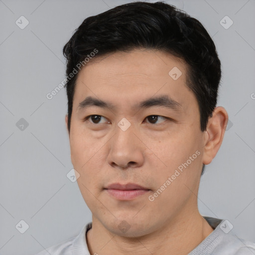 Neutral asian young-adult male with short  black hair and brown eyes