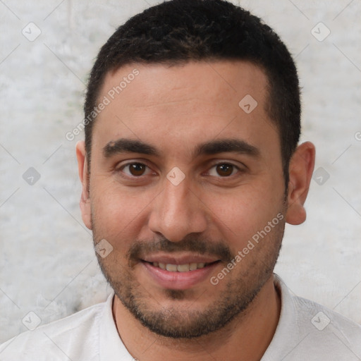 Joyful white young-adult male with short  black hair and brown eyes