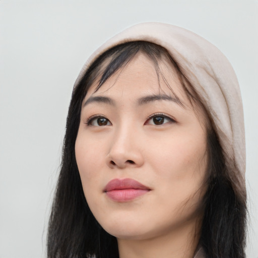 Neutral white young-adult female with long  black hair and brown eyes
