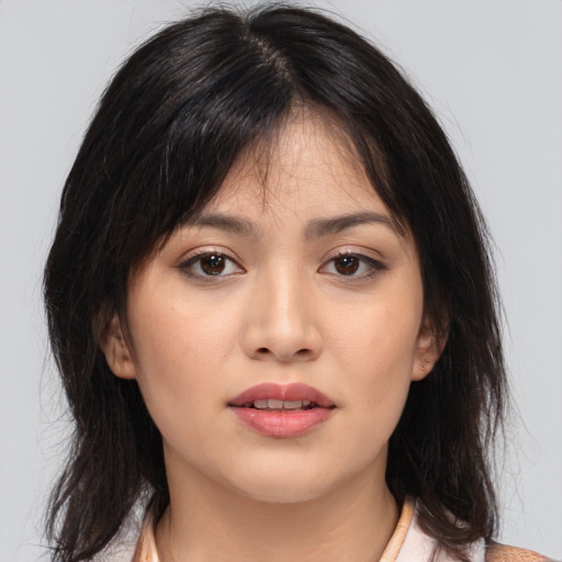 Neutral asian young-adult female with medium  brown hair and brown eyes