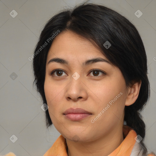 Joyful latino young-adult female with medium  brown hair and brown eyes