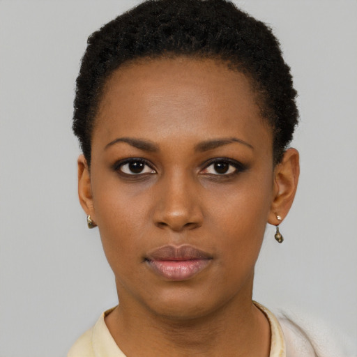 Neutral black young-adult female with short  black hair and brown eyes