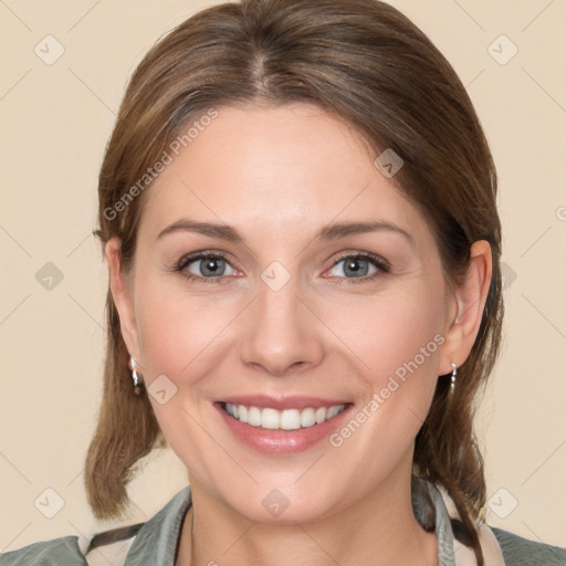 Joyful white young-adult female with medium  brown hair and grey eyes