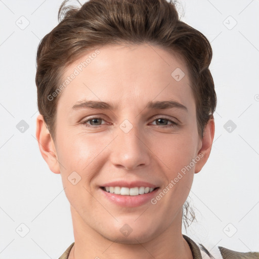 Joyful white young-adult female with short  brown hair and grey eyes