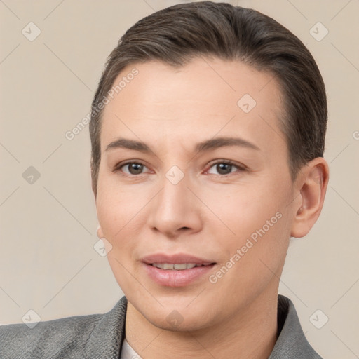 Joyful white young-adult female with short  brown hair and brown eyes